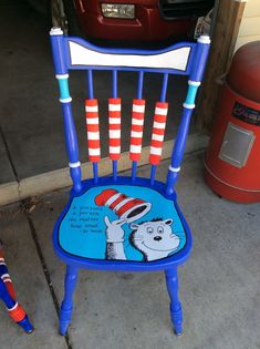 a blue chair with dr seuss on it