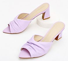 Take a smart step forward in these sophisticated mules. A pointed toe is a classic touch, making them ideal when paired with skirts, capris, or shorts. From Intentionally Blank. Spring Office Mules With Heel Strap, Chic Mules For Workwear, Chic Fitted High Heel Mules, Feminine Mules For Formal Summer Occasions, Trendy Formal Mules, Summer Almond Toe Heels With 4-inch Heel, Feminine Party Mules For Spring, Feminine Spring Party Mules, Elegant Spring Evening Mules