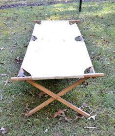 Vintage Folding Cot Wooden Frame Worn Canvas Fabric Military Cot Bed Camping Bed Rustic Primitive Day Bed Wood Frame Cot PanchosPorch Vintage folding cot with wooden frame. Very worn and distressed canvas fabric. Old military cot or camping bed. Rustic and primitive. Add a new cover and this will be an awesome piece! Great for a cabin, kids room, porch.... Good condition. Sturdy.  Measures 75"  x 28", 18"  high when opened. Closed- 38" x 8" x 6". I do my best to describe my items well. Zoom in on my pictures and should you have any questions, please ask! By purchasing any item in my shop, you are agreeing that you read the full description including photos. WE DO NOT ACCEPT RETURNS, EXCHANGES OR CANCELLATIONS. COMBINED SHIPPING: If you are interested in more than 1 item, shipping costs may Cabin Kids Room, Bed Wood, Cot Bed, Rustic Bedding, Camping Bed, Vintage Camping, Safari Party, Day Bed, Cot Bedding