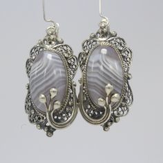 "Armenian Natural Lace Agate Silver jewelry Set - Vintage Style Ring Earrings Pendant, Agate Woman's Jewelry, Crystal Gemstone Jewelry Set Author's design Handmade Agate is unique. No other precious, semi-precious or ornamental stone can boast of such a number of types, species, subspecies and families. At the same time, any agate pleases the eye, warms the soul, captivates the mind. Ahates - Greek for \"happy\" Colored stones are still considered a successful find - what can we say about the ti Bohemian Agate Earrings For Gift, Bohemian Agate Earrings Gift, Bohemian Oval Earrings For Gift, Antique Silver Agate Jewelry, Antique Agate Silver Jewelry, Elegant Handmade Agate Earrings, Nickel-free Oval Agate Jewelry, Handmade Chalcedony Earrings As Gift, Handmade Chalcedony Earrings For Gifts