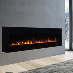 a modern fireplace in the middle of a living room