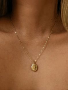 An oval locket with a floral border is placed on our 0.6mm Box Chain. Layer for effect (we recommend) or wear on its own. Always made in 100% 14k gold. Necklace Gold Locket, Gold Jewelry Locket, Dainty Gold Locket Necklace, Small Gold Heart Locket, Pendant For Necklace, Golden Locket Necklace, Real Gold Necklaces, Real Gold Locket, Vintage Locket Necklace Victorian