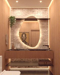 a bathroom with a sink, mirror and toilet in it's centerpieces