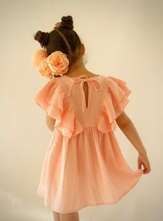 🦋 Step into the sun-kissed days of summer with our enchanting Muslin Flutter Sleeve Dress, the ideal butterfly dress that weaves together the lightness of a butterfly's touch with the comfort your little one craves during those balmy months.  This light and airy boho toddler dress is perfect for a dreamy beach vacation or a special event. Featuring adorable butterfly sleeves and a fun twirly skirt this dress will make any girl feel like a princess. The ideal beach wedding guest dress or birthda Muslin Clothing, Butterfly Dresses, Boho Toddler, Beach Wedding Guest, First Birthday Dress, Dreamy Beach, Muslin Dress, Beach Wedding Guests, Twirly Skirt