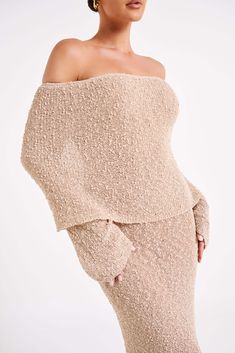 Wrapped up.MARISOL is a ribbed design dress made from a Boucle material that is both flattering from up close and across the room. The natural stretch of the fabric creates a figure-sculpting silhouette, while also featuring a unique drape-styled, off-shoulder neckline combined with flared long sleeves. Style yours with the Brandy Ankle Strap Heels to complete the look. FEATURES: Strapless neckline Long sleeve and overlay Elasticated top edge Soft boucle knit feel Unlined Maxi length FIT, FABRIC Boucle Material, Figure Sculpting, Boucle Knit, Sleeves Style, Strapless Neckline, Crop Top Dress, Shoulder Cut, Design Dress, Ankle Strap Heels