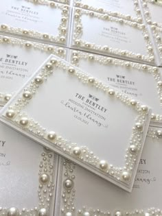 wedding stationery cards with pearls on them