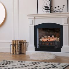 a fireplace with logs in front of it