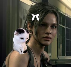 a woman holding a white cat in her right hand and looking at the camera with an angry look on her face