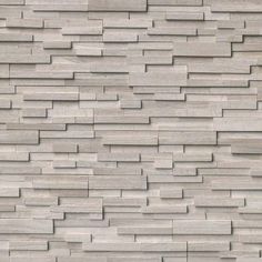 an image of a wall made out of wood planks in grey tones with white paint