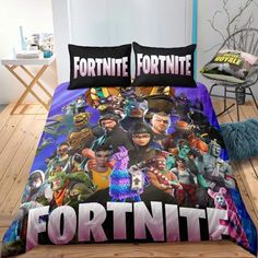 a bed with fortnite comforter and pillows on it