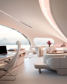 the interior of a yacht with white furniture and large windows on both sides of it