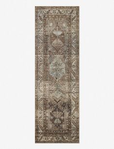 a large rug with an intricate design on the front and back side, in grey tones