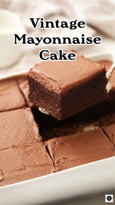 chocolate brownies on a white plate with the words vintage mayonnaise cake