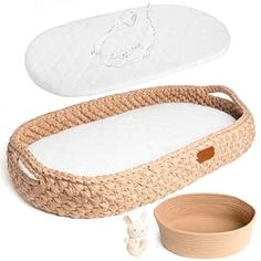 a baby's bed and bowl are shown in this image