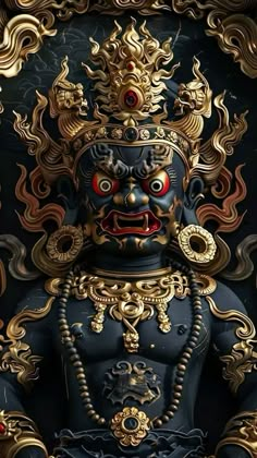 an ornate statue with gold and red decorations on it's face, in front of a black background