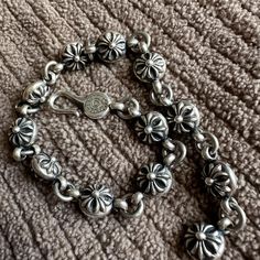 Chrome hearts ball bracelet 
OFFERS ACCEPTED 
Silver flower bracelet with lobster clasp #silverjewellery Chrome Hearts Jewelry, Silver Flower Bracelet, Hearts Jewelry, Ball Bracelet, Mens Accessories Jewelry, Flower Bracelet, Chrome Hearts, Silver Flowers, Men's Jewelry