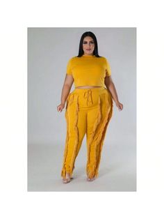 Elevate your wardrobe with our Crop Top Two-Piece Set, a chic ensemble that seamlessly combines modern style with comfort. Crafted from a luxurious blend of 95% polyester and 5% spandex, this set offers a soft, stretchy feel that moves with you throughout the day.

Key Features:
- Fabric: Made from 95% polyester and 5% spandex for a comfortable and flexible fit.
- Fit: Features a crop top with a round neck and short sleeves, paired with high-waisted pants.
- Color Options: Available in Dijon.
- Chic Stretch Sets For Loungewear, Chic Stretch Two-piece Pant Set, Trendy Fitted Two-piece Loungewear Set, Fitted Two-piece Set For Loungewear, High Stretch Solid Color Summer Sets, Chic Stretch Matching Pant Set, Chic Fitted Pant Set For Loungewear, Chic Fitted Loungewear Pant Set, Stretch Pant Set For Spring Loungewear