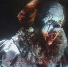 an evil clown with his mouth open and tongue out