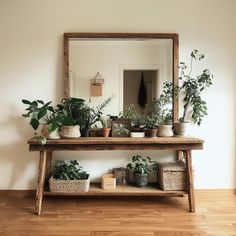 Handcrafted Wooden Console Table with Unique Tree-Shaped Bookshelf - Elevate Your Home Decor Add a statement piece to your home with this handcrafted console table, paired with an eye-catching tree-shaped bookshelf. This stunning set combines clean, modern lines with an organic, branching bookshelf design that draws attention and brings character to any room. Made from high-quality solid wood, the console table and bookshelf showcase remarkable natural wood grain, enhancing their rustic charm. Each piece reveals beautiful variations and textures that highlight the unique beauty of the wood, with curves and edges carefully sculpted to emphasize the wood's natural patterns. Treated with an anti-termite spray, this durable set is built to last, offering style and longevity. Key Features Handc Console Table With Plants, Plant Console Table, Farmette Ideas, Japandi Console Table, Table With Plants, Rustic Entryway Table, Tree Bookshelf, Console Table Styling, Wooden Console Table