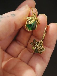 Check out this item in my Etsy shop https://www.etsy.com/listing/1059874489/dragonfly-sun-catcher-earrings Nickel-free Gold Dragonfly Jewelry, Green Spiritual Earrings For Gift, Spiritual Green Earrings For Gift, Metal Earrings For May Birthstone Gift, May Birthstone Metal Earrings For Gifts, Elegant Green Dragonfly Shaped Jewelry, Adjustable Dragonfly Jewelry With Lobster Clasp, Nickel-free Adjustable Dragonfly Jewelry, Handmade Green Dragonfly Jewelry