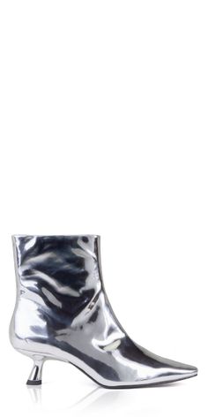 PLEASE NOTE THIS ITEM IS FINAL SALE Upgrade your wardrobe with the sleek and stylish Simon Miller Kuki Ankle Boot. Made from metallic chrome silver leather, it features a classic pointed toe and sculptural kitten heel for a timeless yet modern look. Elevate any outfit with this must-have addition. Details: Color: Chrome 100% leather Heel height: 5cm/2in Boot shaft: 16cm Vendor Code: F171-9137 Zip closure Fits true to size; European sizing Glamorous Metallic Shiny Boots, Glamorous Metallic Boots, Glamorous Metallic Heeled Boots For Evening, Modern Pointed Toe Heeled Boots For Party, Chic Metallic Heeled Boots For Formal Occasions, Chic Metallic High-heeled Boots, Modern Metallic Pointed Toe Heels, Chic Metallic High Heeled Boots, Fall Metallic Pointed Toe Heeled Boots