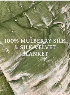 an image of a blanket with the words 100 % mulberry silk and silk velvet blanket