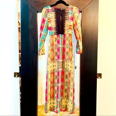 This Timeless Multi-Colored Dress Is So Versatile; Vintage, Boho Chic, Dressy, Casual Or Wear With Denim Jacket. The Size Is Xs-S Bc It Has Elastic Waist. It Has The Perfect Flow For A Long Dress And Is Super Comfortable. It’s Very “Johnny Was” Style But Got In A Boutique In S. Beach. Multicolor Long Sleeve Dress With Vibrant Print, Bohemian Midi Dress With Vibrant Print For Party, Multicolor Print Long Sleeve Dress For Festival, Long Sleeve Multicolor Print Dresses For Festival, Colorful Bohemian Long Sleeve Maxi Dress, Vibrant Printed Long Sleeve Dress, Vibrant Long Sleeve Printed Dress, Colorful Long Sleeve Bohemian Dress, Patterned Spring Maxi Dress For Parties