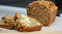 a loaf of bread sitting on top of a cutting board