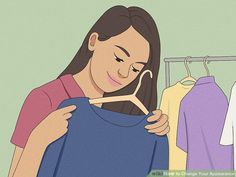 a woman is looking at her t - shirt on the hanger and trying to decide if it's appropriate