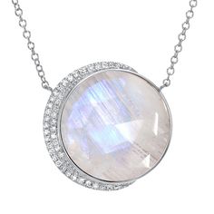 Be bold and unique with this stunning larger size moon phase necklace. Featuring a truly breathtaking 16mm diameter center stone, cut in-house from all-natural materials, and nestled into a custom-made gold setting with natural, conflict-free diamonds, this gorgeous necklace is sure to become the centerpiece of your jewelry collection. Rainbow moonstone, a feminine stone with relaxing energy, is a great choice for this bold contemporary style. We use all-natural stones in each and every piece we Luxury Mystical Moonstone Necklace, Unique Moon-shaped Moonstone Necklace, Bohemian Moon-shaped Gemstone Necklace, Spiritual Moonstone Nickel-free Necklace, Spiritual Moon-shaped Gemstone Necklace, Moon Phases Necklace, Rainbow Moonstone Necklace, Moonstone Necklace, Fine Jewelry Collection