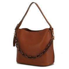 This Chain Vegan Leather Hobo Bag is the perfect everyday companion. Crafted from pebble vegan leather, this bag is both stylish and ethical. With a roomy interior, you can fit all of your daily essentials. The magnetic snap fastening ensures your items stay secure and a long adjustable strap allows for comfortable carrying. Pebble Vegan Leather Magnetic snap fastening Interior wall zip pocket + two slip pockets Measurements: 15” W x 10” H x 5” D Adjustable Shoulder strap: 6”-11”