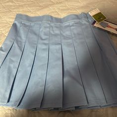 Brand New Pleated Blue Tennis Skirt Great Condition Blue High Waist Pleated Skirt For Spring, Spring Blue High Waist Pleated Skirt, High Waist Blue Pleated Skirt For Spring, High Waist Light Blue Lined Skirt, Light Blue High Waist Lined Skirt, High Waist Light Blue Lined Mini Skirt, Casual Blue Pleated Skirt, Blue Pleated Skort, High Waist Blue Pleated Mini Skirt