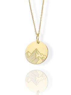 9K Solid Gold Mountain Necklace - Engraved Mountain Pendant - Gold Mountain Jewelry  Find all the information you need about your pendant : Material: 9K Solid Real Gold Stamp: 375 (9K) Pendant's Size: ( 6 sizes available) -       0.52 inches / 13mm  (diameter) -       0.59 inches / 15mm (diameter) -0.70 inches / 18mm (diameter) -0.78 inches / 20mm (diameter) -0.86 inches / 22mm (diameter) -0.94 inches / 24mm (diameter) Pendant Thickness: 0.5mm Inner diameter of the jumpring: 4mm FREE Backside Engraving Gift Box Included! Necklace Length: (thin and dainty) - Without Chain - 16 inches / 40cm - 18 inches / 45cm - 20 inches / 50cm Add your personalized engraving on the back for FREE, we recommend a maximum of 5 lines with 10-15 characters on each side. Personalized/Custom orders cannot be retu Laser Engraved Round Yellow Gold Necklace, Gold-tone Medallion Pendant Necklace Gift, Engraved Recycled Gold Amulet Necklace, Adventure Necklace, Wooden Mountain Necklace, Mountain Pendant, Gold Mountain, Mountain Jewelry, Mountain Necklace