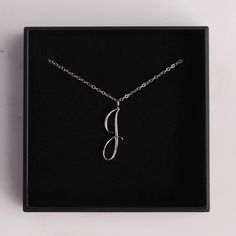 "J initial Necklace / Alphabet jewelry / Letter \"J\" silver pendant / Silver chain / Silver necklace / Dainty Silver chain and jewelry Dainty \"J\" initial. Perfect every day necklace. Lovely gift for your self, sister, bridesmaids, new mom. Convo me if you would like to customize the length of the chain. The possibilities are endless. Pendant: Base metal is brass and silver plated on top. Chain is 18 inches, sterling silver. (if you would like a longer or shorter chain, please contact us to cu Silver Initial Pendant Charm Necklace With Adjustable Chain, Silver Monogram Initial Pendant Charm Necklace, Silver Monogram Charm Necklace With Initial Pendant, Silver Minimalist Initials Name Necklace, Minimalist Silver Initials Name Necklace, Silver Minimalist Necklace With Initials, Minimalist Silver Monogram Necklace, Silver Chain Initial Pendant Necklace As Gift, Silver Monogram Name Necklace In Minimalist Style