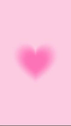 a pink heart on a pink background