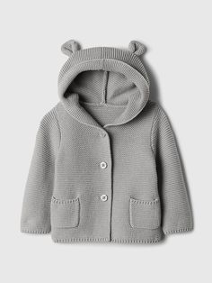 a baby's gray knitted jacket with ears on the hood and buttons at the back