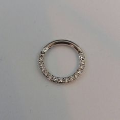 Septum Clicker / Nose ring 8mm-16g White diamonds 100% Natural diamonds G - VS2 - 1.25mm - 0.15ct Can make clicker without a button Inner Diameter; 6mm,8mm,10mm Septum ring:12g,14g,16g.18g Materials :14K Solid gold Options gold : 18k solid gold yellow god,rose gold,white gold White Gold Septum Ring With Prong Setting For Anniversary, White Gold Prong-set Septum Ring For Anniversary, Silver Septum Ring With Prong Setting, Silver Diamond Septum Ring, Small Hoop White Gold Jewelry With Halo Design, 14k White Gold Round Septum Ring, Yellow Gold Sterling Silver Septum Ring, White Gold Septum Ring With Prong Setting, White Gold Septum Ring With Vvs Clarity