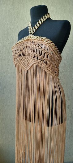 Beige Dresses For Festivals, Beach Party Season Dresses With Fringe, Hippie Style Fitted Party Dress, Bohemian Fitted Dresses For Party Season, Bohemian Dress For Party Season, Bohemian Party Dresses For Party Season, Sleeveless Fringe Mini Dress For Festivals, Bohemian Beaded Fringe Flapper Dress For Party, Bohemian Flapper Dress With Beaded Fringe For Party