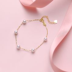 Delicately crafted, this 18K Gold Chinese Akoya Pearl Tin Cup Bracelet is a symbol of refined elegance. Featuring 7-8mm Akoya pearls, rated AAAA for quality, these pearls are elegantly spaced along an 18K gold chain, embodying the chic Tin Cup style. The bracelet measures 16.5cm in length with an additional 5cm extension, ensuring a perfect fit. This piece is ideal for those seeking to add a touch of sophistication to their attire with the timeless beauty of Akoya pearls and the luxury of gold. Luxury White Gold Akoya Pearl Bracelet, Fine Jewelry Pearl Bracelet For Anniversary, Akoya Pearl Drop Round Bracelets, Akoya Pearl Drop Bracelet, Formal Akoya Pearl Bracelet With Pearl Charm, Gold Pearl Bracelet For Formal Occasions, Gold Pearl Bracelet For Formal Events, Gold Akoya Pearl Round Bracelet, Gold Akoya Pearl Bracelet