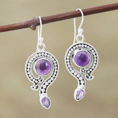 These beautiful dangle earrings are presented by Shanker of India. Expertly crafted by hand, a stunning sterling silver motif encircles a checkerboard-faceted amethyst. Petite dots of silver decorate the middle of the motif, which is reminiscent of a question mark. A faceted pear-shaped amethyst sparkles brightly from the end, completing the uniquely elegant design. The gemstones total over six carats. A Question Mark, Amethyst Color, Amethyst Earrings, Question Mark, Artisan Craft, Hook Earrings, Cute Earrings, A Question, Pear Shaped