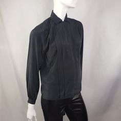 "by Kristin, black blouse with hidden buttons panel and front pleats. Fits Medium 19\" across 23\" long 23\" sleeves * Please review all shop policies before completing transaction. All sales final. No returns or exchanges. * Bundle up for combined shipping. * Instagram @vintagerunsdeepshop" Classic Collared Top For Evening, Formal Collared Top With Pleated Sleeves, Fitted Workwear Blouse With Pleated Sleeves, Classic Pleated Office Tops, Formal Long Sleeve Blouse With Pleated Sleeves, Classic Black Blouse For Formal Occasions, Collared Evening Tops For Fall, Black Evening Shirt For Fall, Evening Collared Tops For Fall