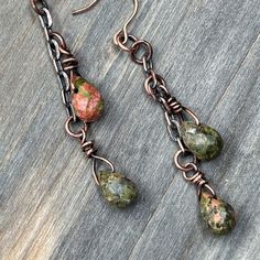 Elegant boho minimalist earrings are a great addition to any outfit, dress up for an evening out or everyday wear for a casual look. These handcrafted gemstone dangle earrings feature Unakite gemstones and chain for an elegant dangle. Rose Gold Filled French ear wires.   Unakite is a stone of vision. It balances emotions with spirituality. Placed on the third eye, it opens it and promotes visualization and psychic vision. This stone also provides grounding when it is needed and can be useful aft Bohemian Linear Dangle Earrings With Ear Wire, Handmade Copper Beaded Earrings, Earthy Dangle Jewelry For Everyday, Bohemian Dangle Linear Earrings For Gift, Copper Wire Dangle Earrings, Minimalist Drop Earrings With Dangling Beads, Copper Wire Dangle Jewelry For Jewelry Making, Minimalist Adjustable Earrings With Dangling Beads, Copper Wire Drop Earrings With Matching Set