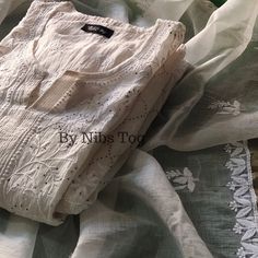 Nibs Tog Roohani Ivory Chikankari Kuta with Dupatta Set Pure Mulmul Chanderi (Semi Stitched), Indian Ethnic Party Wear Chikankari Suit Dyeble Shop More Chikankari outfits by Nibs Tog on our Shop : https://www.etsy.com/in-en/shop/NibsTog PLEASE NOTE: Since its hand embroidery, every design has single piece only, therefore, you may get a different design motif Suit. This also ensures the uniqueness of the outfit you will receive. Please connect us to check the designs available. Package Includes: Kurta+Dupatta Features: Fabric: The Ivory Chikankari Suit is made of Pure mulmul Chanderi Cotton fabric. Super soft & versatile. Style: The Chikankari Suit is made in Slight A Line pattern. The Suit is Semi Stitched and has Chikankari hand embroidery, embellished with mukaish. Colour: The Chikankari Designer Cotton White Sharara, Designer White Cotton Sharara, Traditional Beige Sharara With Straight Kurta, Traditional Cream Sharara With Straight Kurta, White Unstitched Mulmul Sharara, Festive White Chanderi Kurta, Transitional Off White Chanderi Salwar Kameez, Eid Beige Cutdana Salwar Kameez, Beige Cutdana Salwar Kameez For Eid