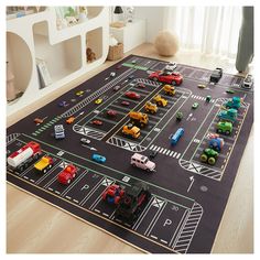 a play mat with cars and trucks on it