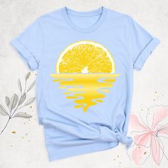 Lemon Shirt, Sunset Tshirt, Aesthetic Fruit Shirt, Cute Summer Graphic Tee, Lemonade Shirt, Women Beach Shirt, Lemon Squeeze Botanical Shirt. Hello, Thanks for your support. Your gladness comes first and all work is done with LOVE in here. Always keep your support please:)   Lemon shirts are branded Bella+Canvas.  Lemon Shirt Contents: - Solid colors: %100 Cotton. - Heather colors: %52 Cotton + %48 Polyester * This ultra-soft graphic tee is made from a comfortable cotton-poly blend that is breat Yellow Summer Top With Sublimation Print, Yellow Sublimation Print Top For Summer, Orange Sublimation Print Top For Summer, Orange Tops With Sublimation Print For Summer, Yellow Printed T-shirt For Summer, Yellow Funny Print Top For Summer, Summer Orange Tops With Graphic Print, Yellow Graphic Print Summer Top, Orange Graphic Print Top For Summer