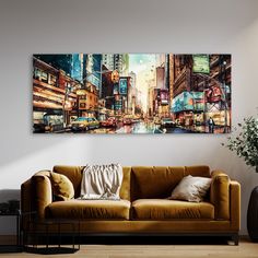 a living room with a couch and painting on the wall