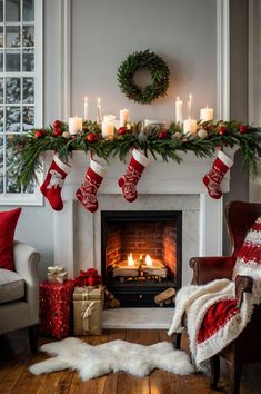 a christmas fireplace with stockings and candles