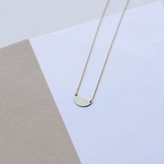 "HALF MOON NECKLACE A dainty gold chain necklace with a small half circle pendant in 9K or 14K solid gold. Minimalist design, delicate necklace ideal for everyday wearing, layered with other necklaces. This semicircle necklace is a great choice for a Mothers Day gift for mom. F E A T U R E S * Metal: High-quality Solid Gold 9K or 14K * Color: Yellow Gold, White Gold, Rose Gold * Dimensions: 15 x 7mm * Length: 16\" to 19.5\" (40cm to 50) Solid Gold jewelry is the best choice if you want your jewe Minimalist Jewelry With Adjustable Half Moon Chain, Minimalist Crescent Necklaces For Everyday, Everyday Minimalist Crescent Necklaces, Elegant Everyday Half Moon Necklace, Minimalist Everyday Necklace With Moon Charm, Everyday Crescent Necklace With Delicate Chain, Minimalist Everyday Moon Charm Necklace, Minimalist 14k Gold Filled Round Necklace, Minimalist Half Moon Necklace With Adjustable Chain