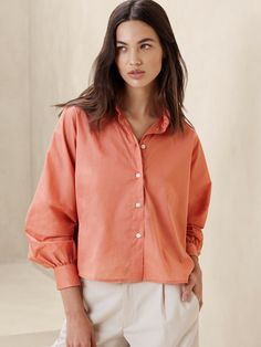 Volume-Sleeve Shirt | Banana Republic Factory Relaxed Fit Cotton Top With Button Cuffs, Relaxed Fit Cotton Tops With Button Cuffs, Cotton Tops With Button Cuffs And Relaxed Fit, Solid Cotton Tops With Cuffed Sleeves, Cotton Blouse With Placket And Relaxed Fit, Solid Cotton Button-up Blouse, Solid Color Cotton Button-up Blouse, Summer Cotton Blouse With Spread Collar, Cotton Blouse With Rolled Sleeves For Daywear