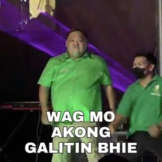 two men standing next to each other in front of a microphone with the words wag mo akong galitin bhi